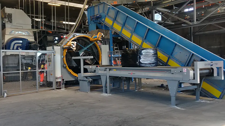 On Image: The Direct Bale Wrapping machine in a process of wrapping alternative fuel bales