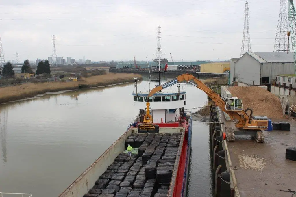 On Image: Bale loading preparation for the shipping